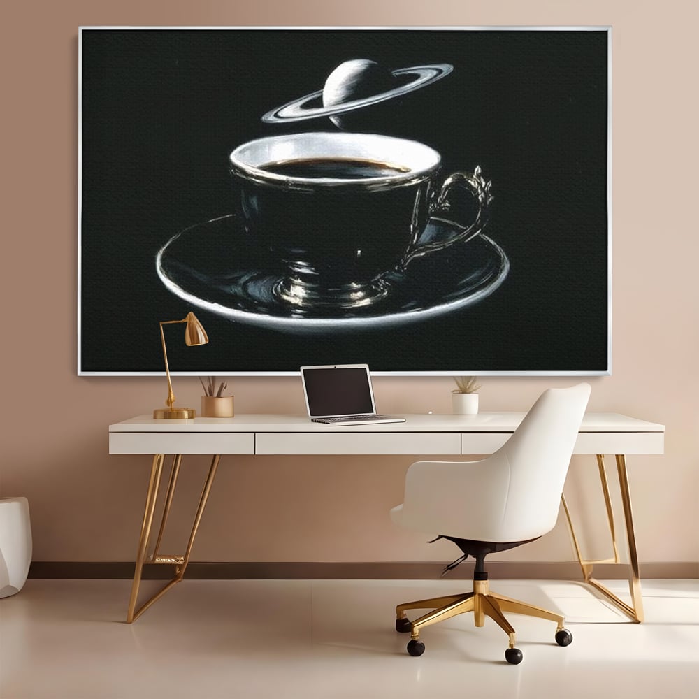 Tablou canvas cu tablou canvas cu ceasca de cafea si planeta, in rama de aluminiu argintiu, pe perete intr-un birou